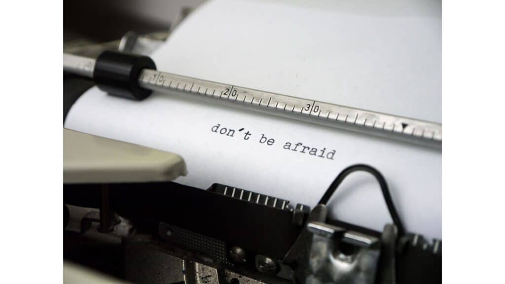 The words "Do not be afraid" typed out on a piece of paper still in a typewriter.