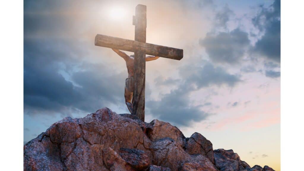 Image of Jesus on a cross from behind.